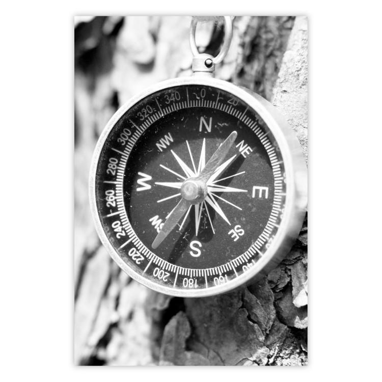 Black and white compass - rocks and a compass pointing the right direction