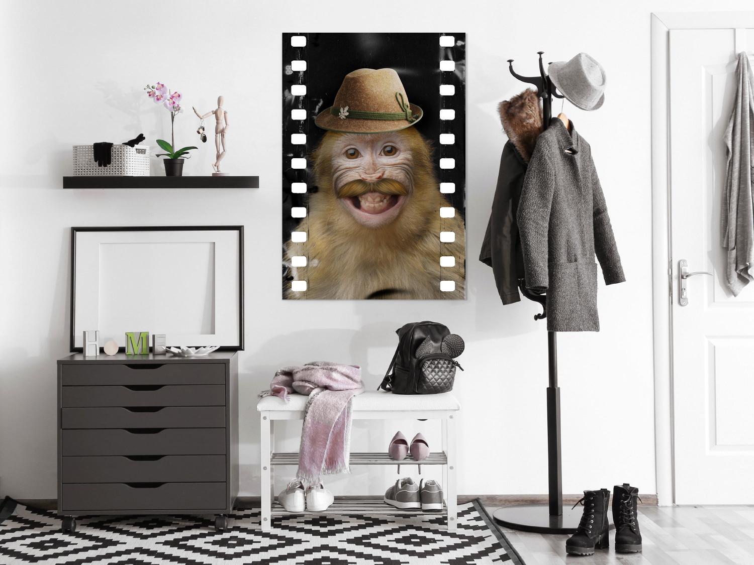 Poster Monkey in a Hat - smiling monkey with mustaches in a cinematic shot