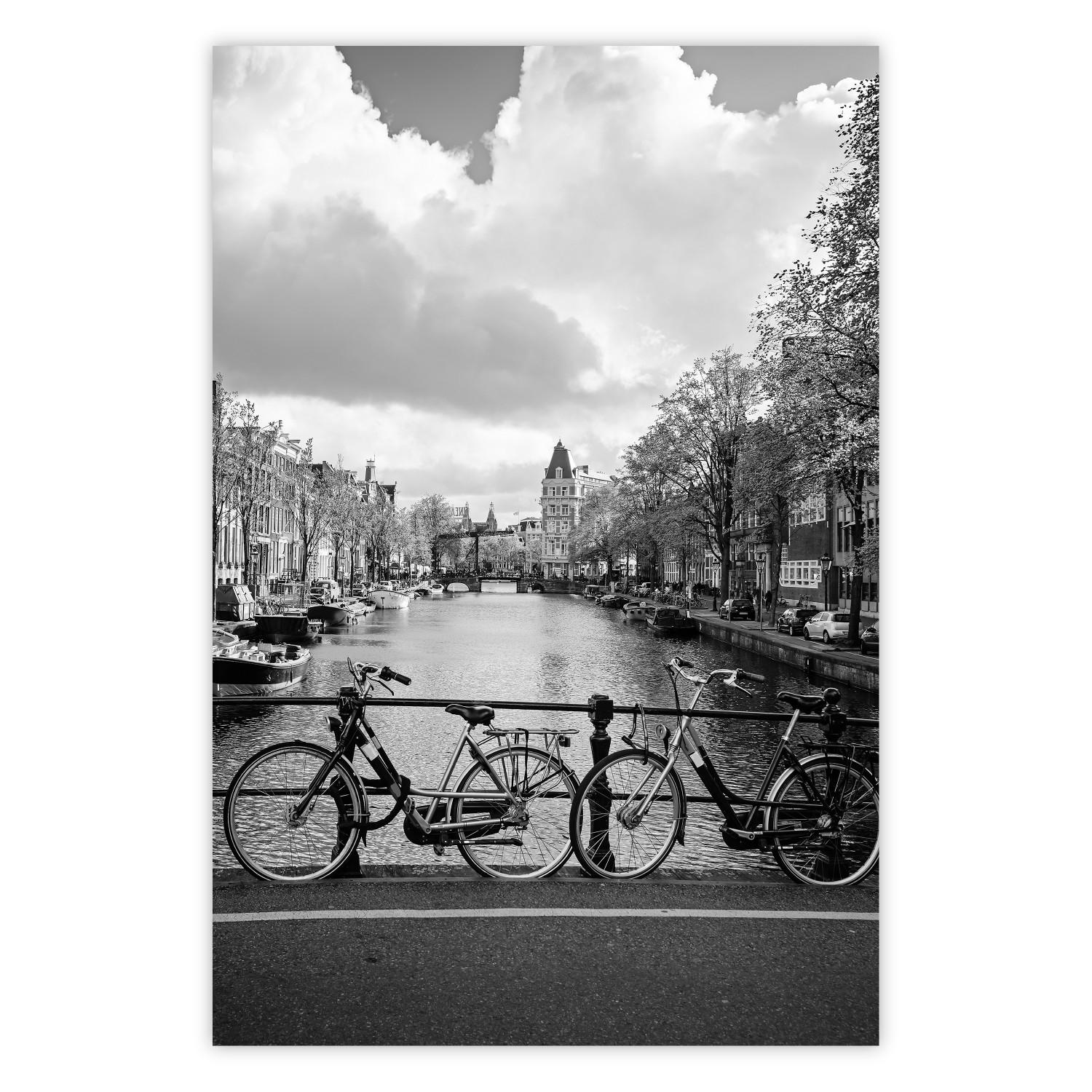 Poster Bridge with Bikes - black and white landscape of a river and cloudy sky