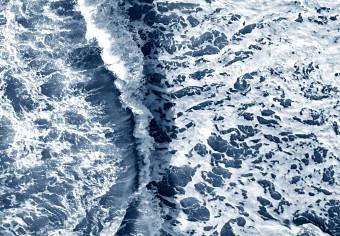 Canvas Sea power - aerial view of Scandinavian waves next to a sandy beach