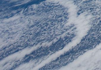 Canvas Space flight - a satellite photo of the Earth and the cloud band