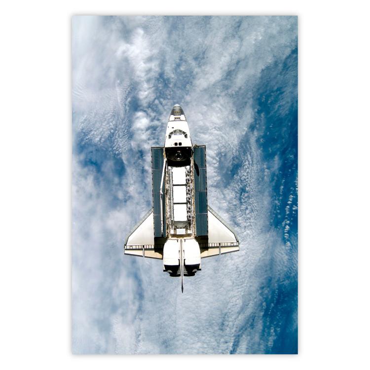 Space Shuttle - white space shuttle against a backdrop of clouds and oceans
