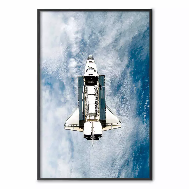 Space Shuttle - white space shuttle against a backdrop of clouds and oceans