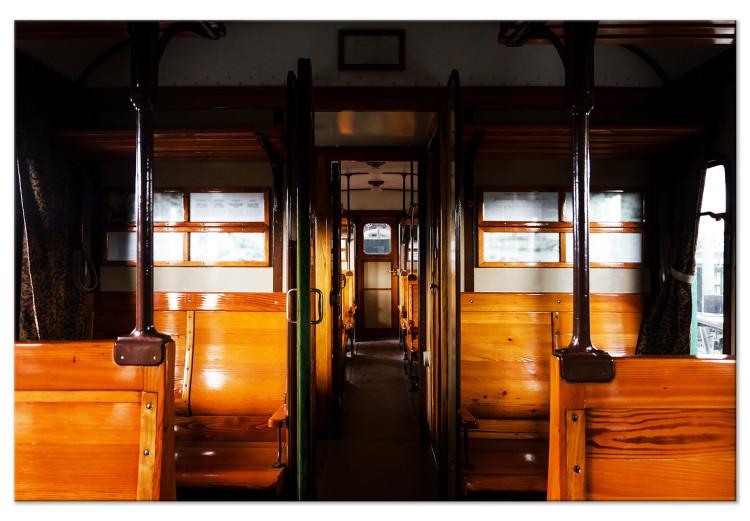 Canvas Print Passenger train - a photo from inside of a wagon with wooden benches
