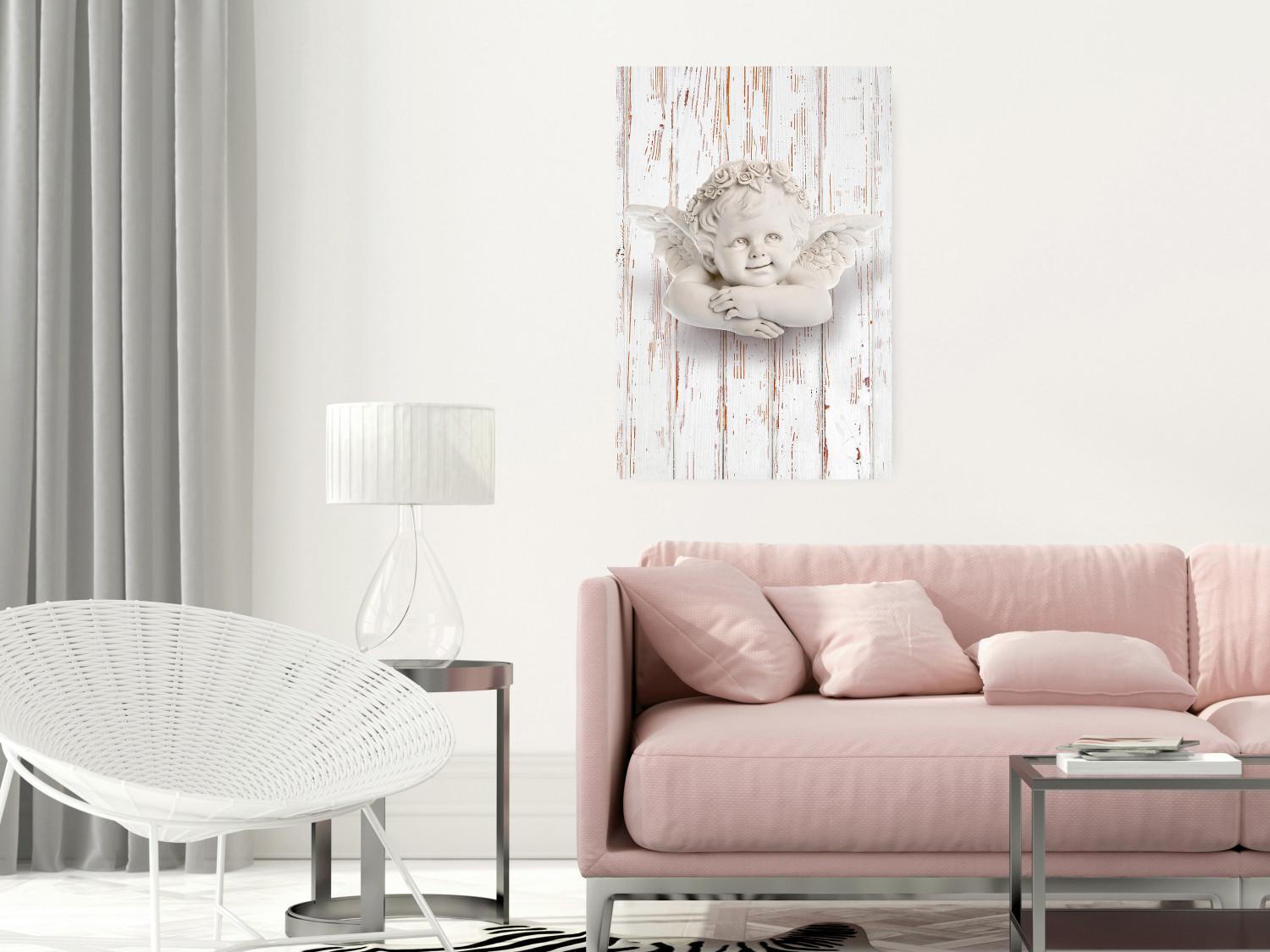 Poster Happy Dawn - sculpture of an angel on a white wooden texture background