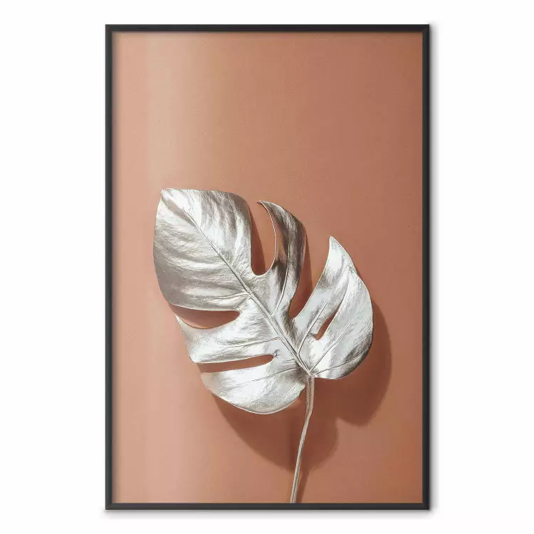 Sunny Keepsake - silver monstera leaf on a uniform light background