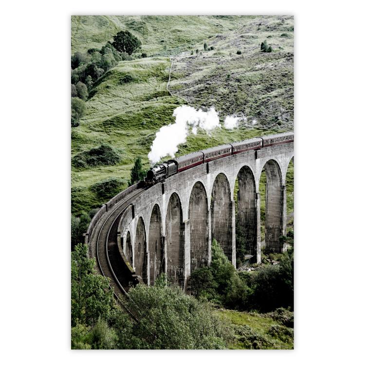 Journey Through Time - landscape of a large viaduct with a train passing through