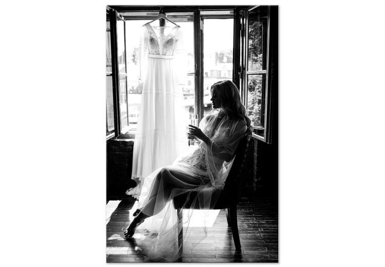 Woman and wedding dress - black and white photo with sitting woman