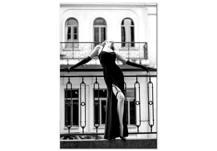 Dancing woman - black and white photo with figure on the balcony