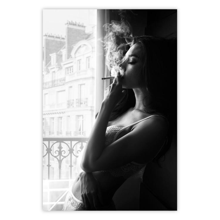 Blissful Moment - black and white photograph of a woman smoking a cigarette