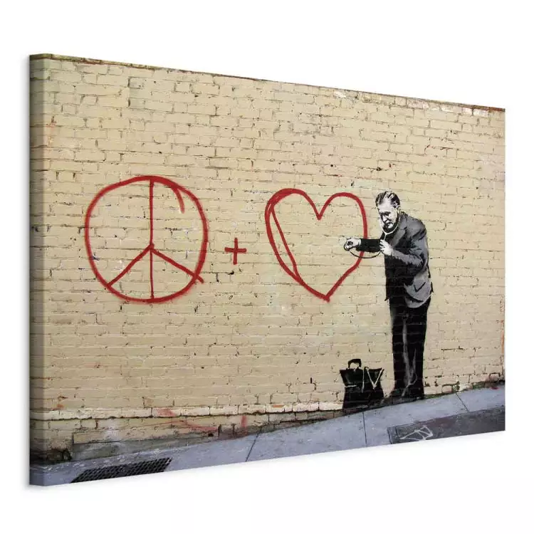 Peaceful Doctor (Banksy) - street art of a man on a brick wall