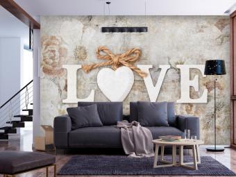 Wall Mural Love - inscription in English on a light background with a delicate flower motif