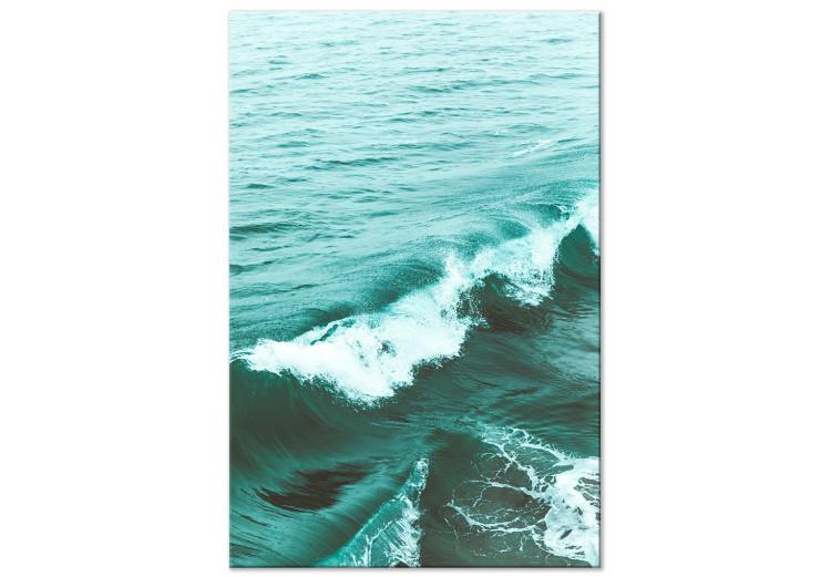 A peaceful wave - deep green sea with a small wave in the foreground