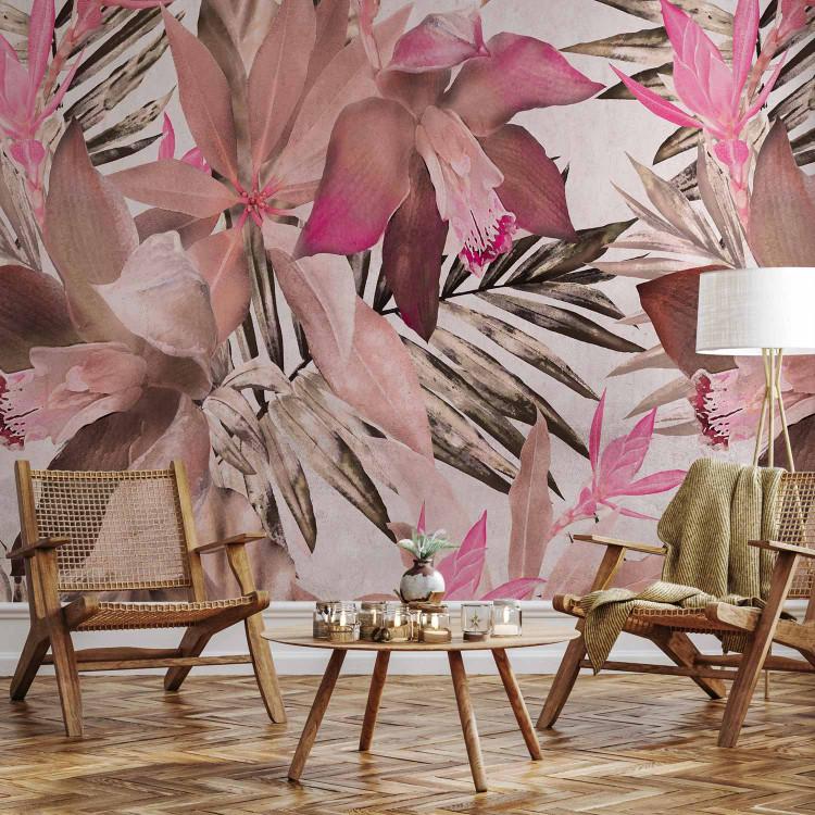 Wall Mural Blooming jungle - pink composition with floral motif and leaves