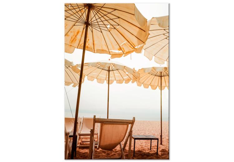 Beach umbrellas - Landscape with sand, sun loungers and Mediterranean