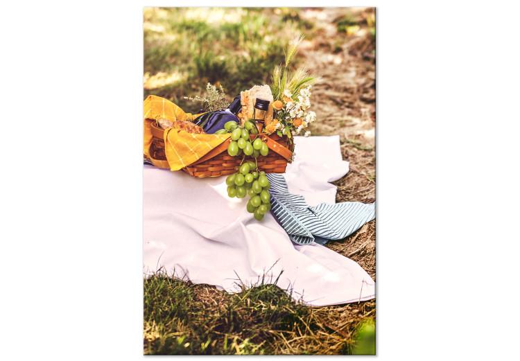 Canvas Print Basket full of food - photo of picnic basket on the meadow
