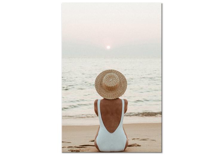Woman in hat on the beach - Marine landscape with sunset