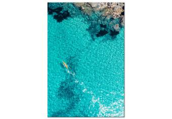 Canvas Azure water - sea landscape with transparent water and a yellow canoe
