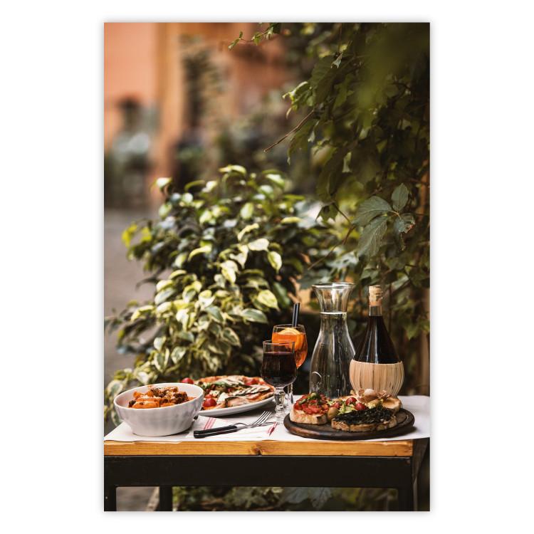 Siesta - composition with wine and Italian food against green plants