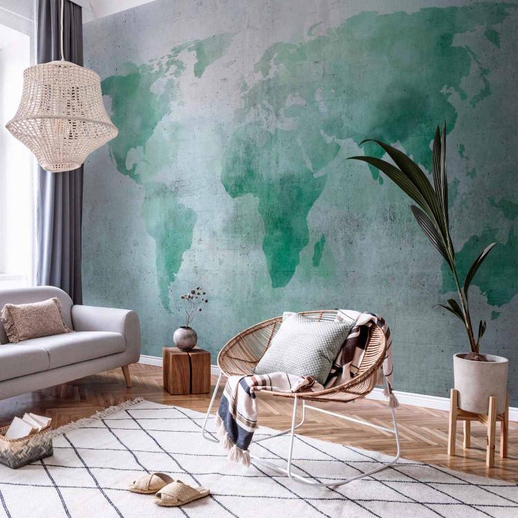 Mint world - watercolour world map on a background with concrete pattern