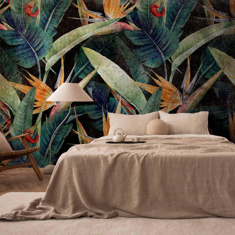Wall Mural Vegetable landscape - exotic jungle leaves with flowers on black background