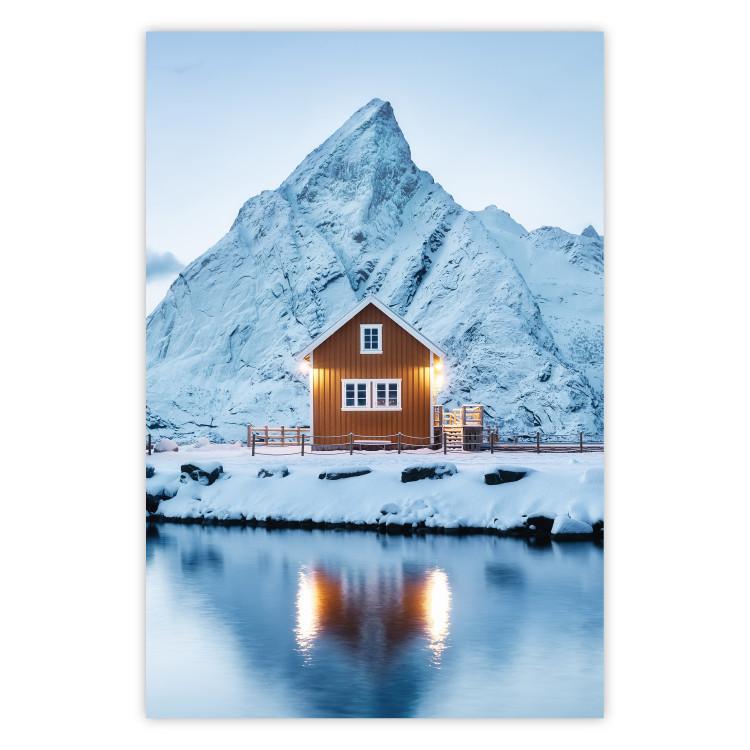 Cottage in Norway - majestic winter landscape of a cottage against mountains