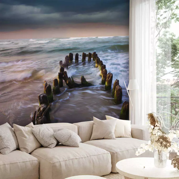 Wall Mural Waves - dark landscape of a restless sea against a cloudy sky