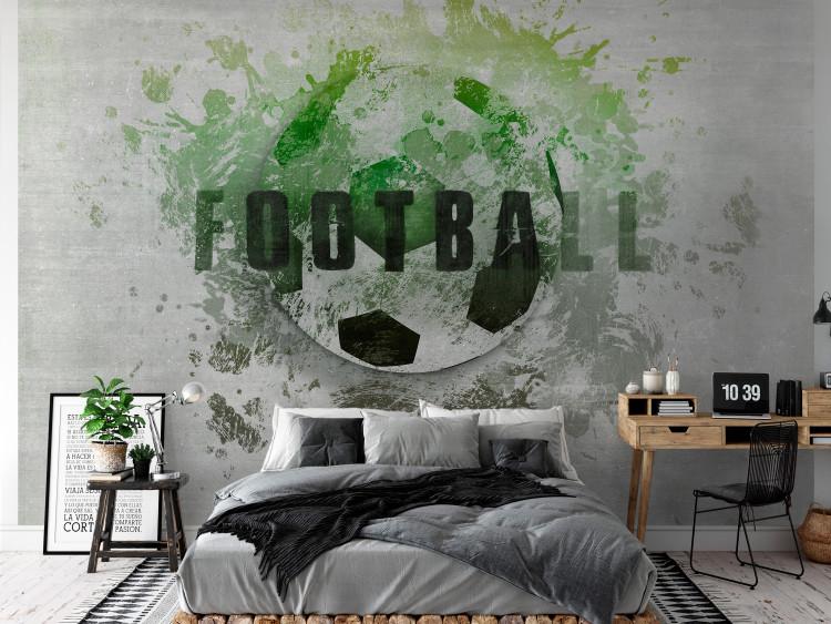 Wall Mural Hobby is football - green motif with a ball and writing in English