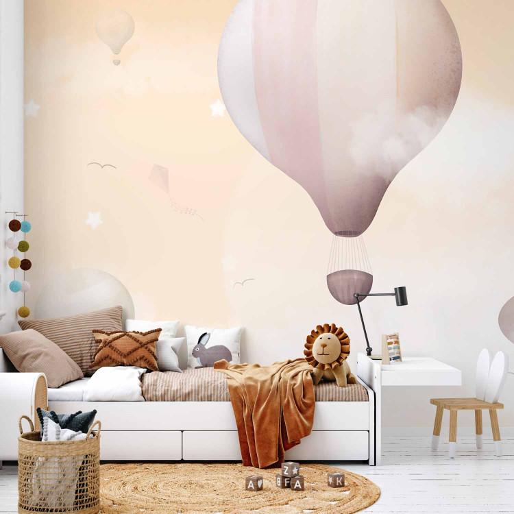 Landscape for children - pastel balloons on the background of the sky with white clouds