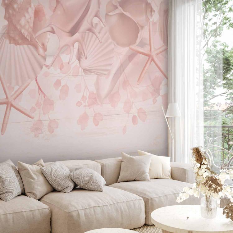 Wall Mural Shells on the beach - landscape in shades of pink with motif of the sea and the beach