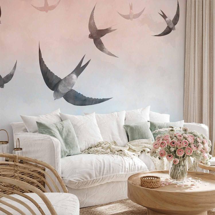 Wall Mural Birds in flight - animals on a background of pastel sky in two colours