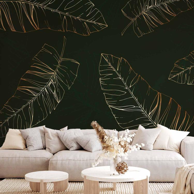 Wall Mural Nature's twitches - gold outline of exotic leaves on dark green background