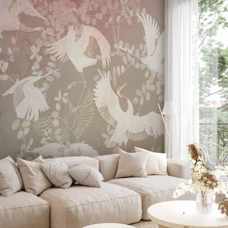 Dancing animals - birds motif among leaves on a dark background with pink