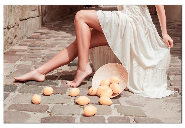 Lemons in the Sun (1-piece) - woman's legs and fruits lying on the street
