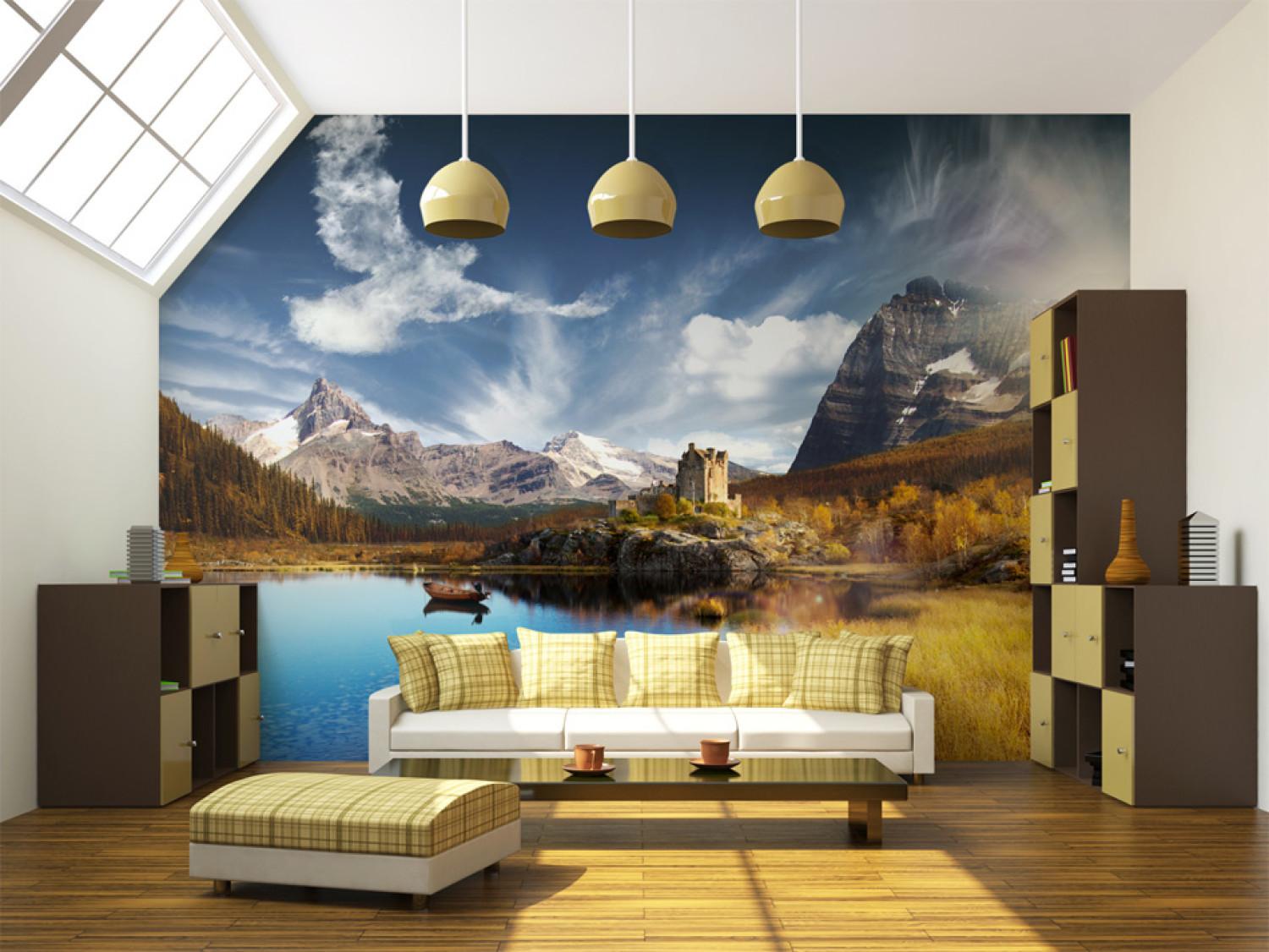 Wall Mural Clouds - Landscape of High Mountains over a Lake under a Blue Sky