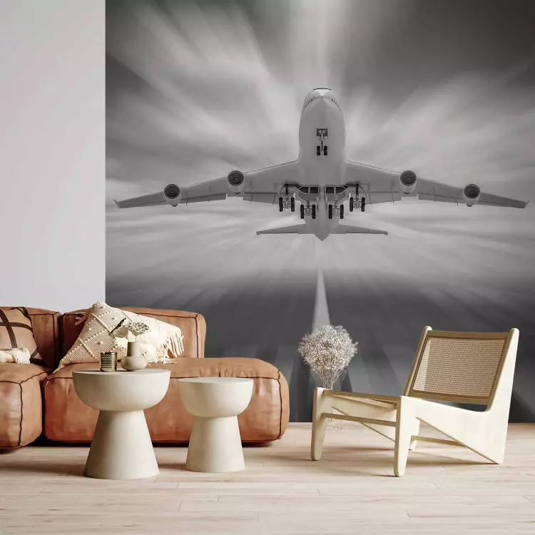 Wall Mural Reaching for the Clouds - Taking off airplane on a black and white background