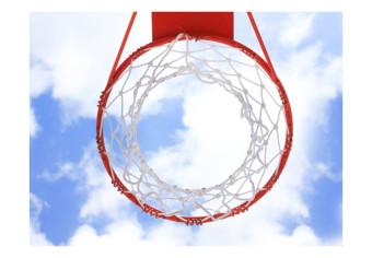 Wall Mural Sporting Hobby - Basketball hoop against a sky background with clouds