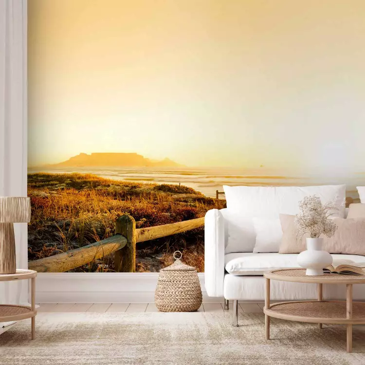 Wall Mural Seascape - Sandy Beach by the Sea Bathed in Sun Rays