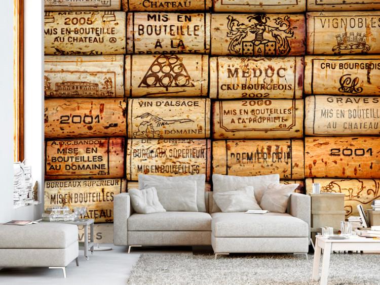 Wall Mural Shabby chic motif - a composition of wine corks with inscriptions in French
