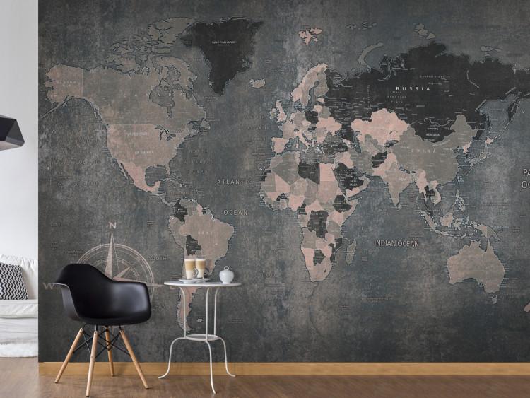 Wall Mural Grey world - map of the continents on a non-uniform background with a compass in the corner