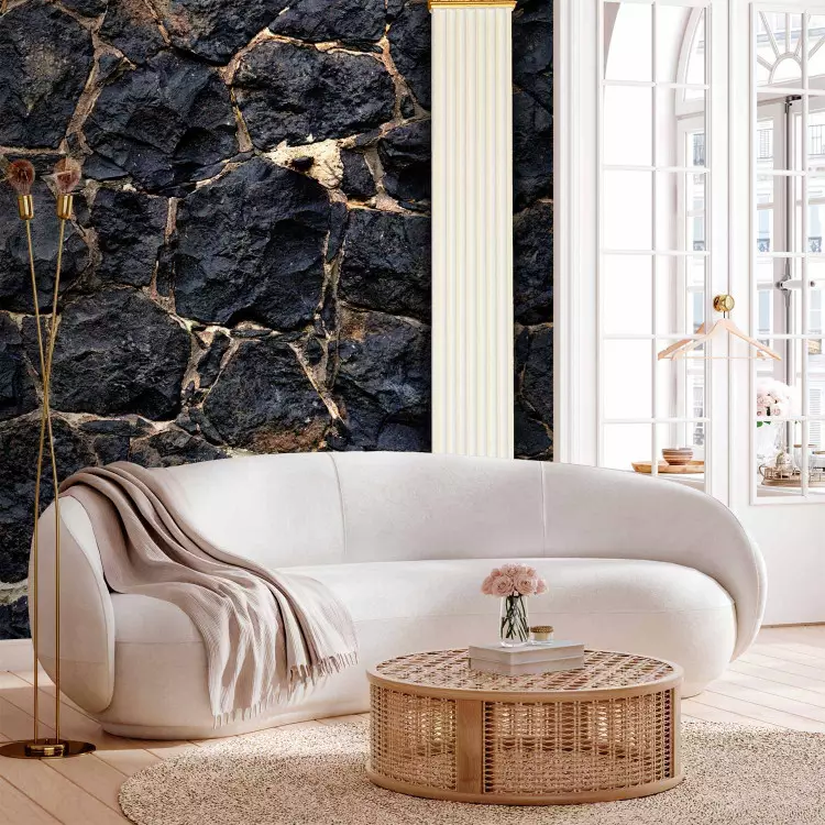 Wall Mural Black kingdom - white columns on a background of textured stone blocks