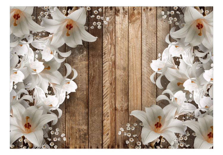 Wall Mural White lilies on wooden wall - a floral motif on brown background 125170 additionalImage 1