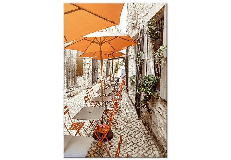 Canvas Italian Cafe - a photo of a narrow streets with tables and umbrellas 135841