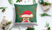 Decorative Microfiber Pillow Curious Christmas reindeer - animal with Santa hat on green background with snowflakes 148485 additionalThumb 5