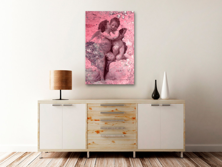 Canvas Angelic kiss - angels in love on an abstract, pink background 118216 additionalImage 3