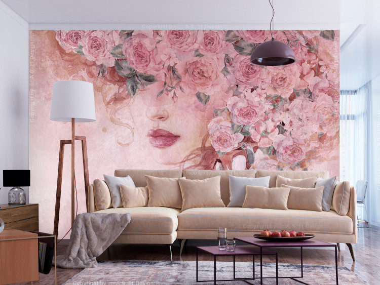 Wall Mural Lady in flowers - portrait of a woman's face draped in pink flowers 135026