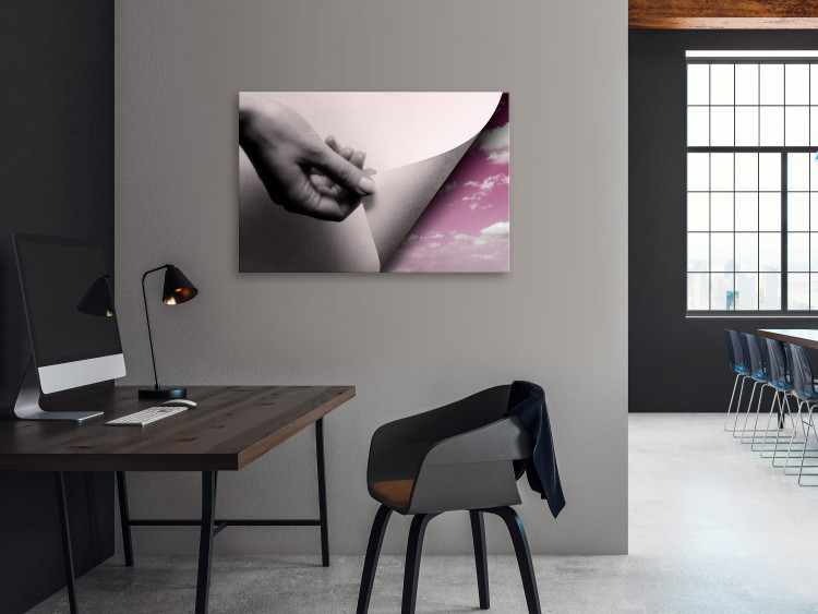 Canvas Discoverer's hand - a pink sky landscape with soft clouds 117157 additionalImage 3