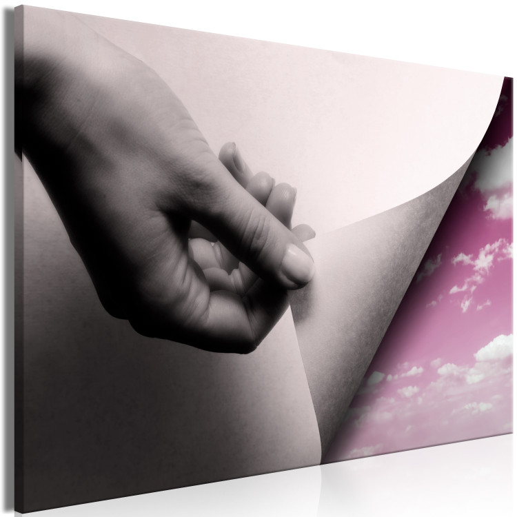 Canvas Discoverer's hand - a pink sky landscape with soft clouds 117157 additionalImage 2