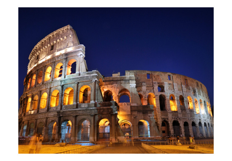 Wall Mural Monuments of Rome - the illuminated Roman Colosseum at night under a dark sky 97208 additionalImage 1