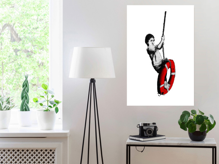 Poster Banksy: Boy on a Swing - black and white boy on a swing with a wheel 132428 additionalImage 2